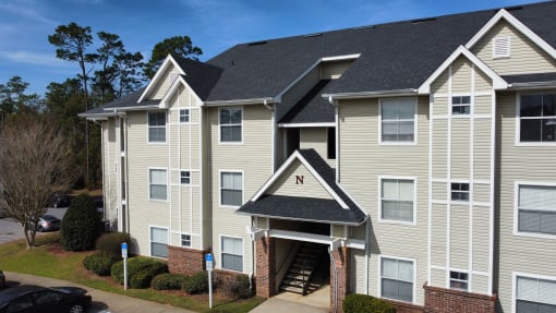 Apartment exterior at The Fountains Apartments, Pensacola, 32514